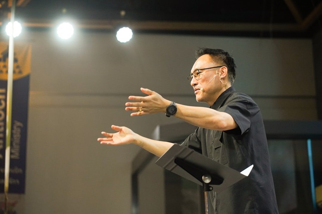 person speaking confidently on stage
